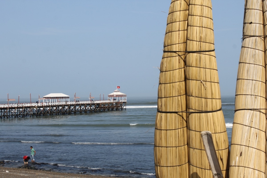 In regards to photographing cities and towns: These Peruvian fishing boats represent a huge part of the culture in Huanchaco, Peru. The boats are made from the indigenous locals by reeds that grow on the local beaches. The reeds are dissipating due to global warming and locals have been known to take their boats into the abyss and never come back as a form of protest. 